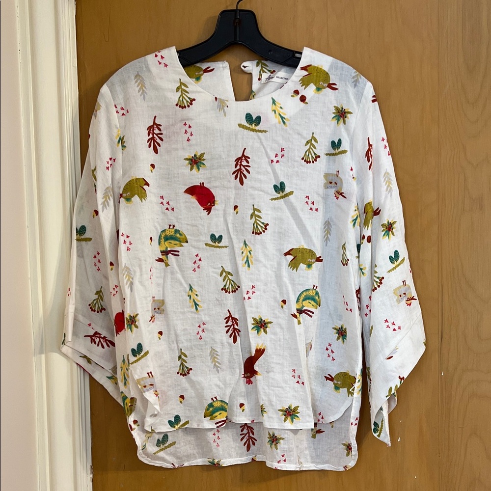 Chic White Blouse with Nature-Inspired Print